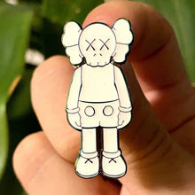 Load image into Gallery viewer, Kaws Hypebeast White Enamel Pin (Glow in the Dark)